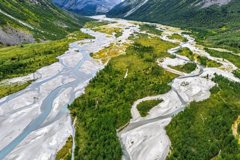 The widely branching arms of river Jostedalsola, Jostedal river, a glacial river originating in the