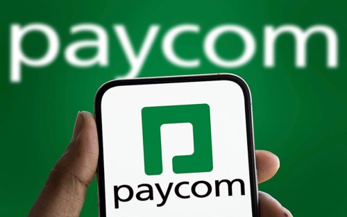 Dhaka, Bangladesh- 19 Jan 2025: paycom logo is displayed on smartphone. Paycom is an American