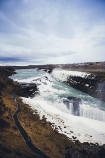 A breathtaking beauty of Gullfoss Waterfall in Iceland. The powerful cascade flows over rugged