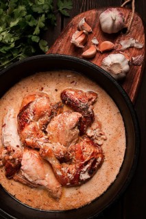 Shkmeruli, fried chicken, in milk-garlic sauce, Georgian cuisine, homemade, close-up, no people