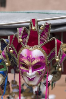 Venetian carnival mask in front of a shop, Burano, Veneto, Italy