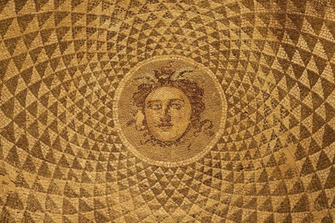 Ancient mosaic with Medusa head in the middle of a circular pattern, Patras Archaeological Museum,