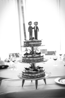 Detail of the dolls on top of the wedding cake, traditional ceremony, black and white photo