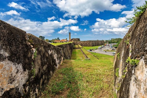 View along a fortress wall with wide sky and landscape, The fortress of Galle in Sri Lanka