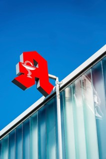 Pharmacy sign on a house facade in Düsseldorf, Germany