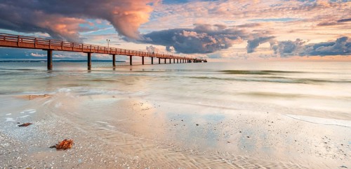 Pier on the beach of the Baltic Sea in the first morning light, Baltic resort Binz, Rügen Island,