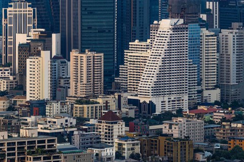 Over the rooftops of Bangkok, view from the Moon Bar on the roof terrace of the Banyan Tree Hotel,