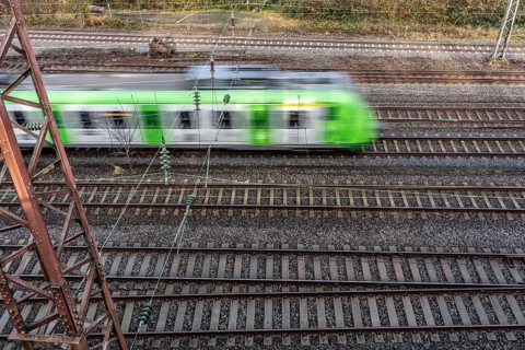S-Bahn train on the route east, in front of Essen main station, regional transport in North