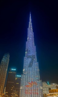 Night shot, illuminated advertising at the Burj Khalifa, Downtown, Dubai, United Arab Emirates