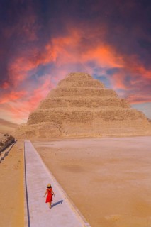A young woman visiting the Stepped Pyramid of Djoser, Saqqara. Egypt. The most important necropolis