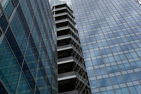 Abstract view of high rise glass fronted office buildings in a Paris commercial and financial
