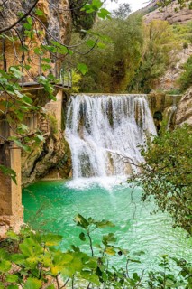 Beautiful landscape in the waterfalls next to the path on the Vero River walkways in Alquezar.