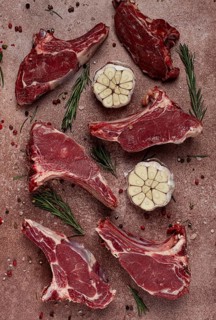 Fresh, raw calf ribs, with spices, top view, no people