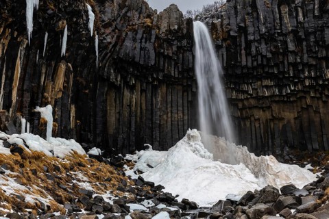 Waterfall, basalt columns, snow, winter, Svartifoss, Iceland, Scandinavia