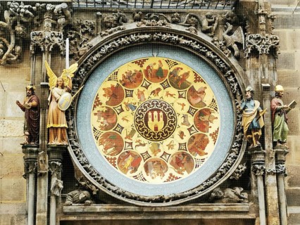 Detailed astronomical clock at Prague City Hall with Gothic sculptures and medieval art style,