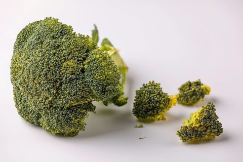 Broccoli head with separated florets in a detailed view