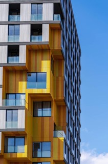 This image captures the intricate blend of materials in modern architecture, highlighting glass,