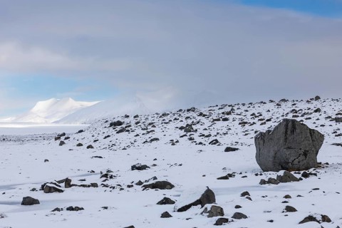 Lava rock field, mountain range, snow, winter, Vatnajökull region, Iceland, Scandinavia