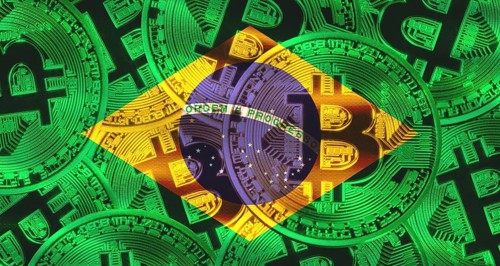 Bitcoin coins on Brazil flag background. Golden bitcoin coins on Brazil flag background