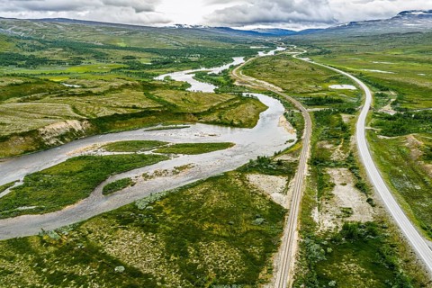 Railway and road E6 near the polar circle, aerial view, Lönsdal, Norway