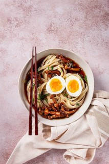 Buckwheat noodles soba with shimeji mushrooms, with boiled egg, green onion, sesame seeds,