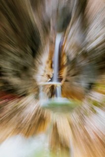 Waterfall with zoom effect Heckenbach waterfall, The dripping eye of nature, Kochel am See,