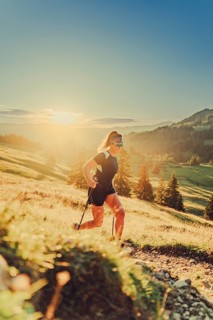 Summer trail running and hiking in the Alps on the Riedberg Pass between Obermaiselstein and