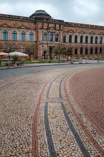 The stunning Zwinger Palace in Dresden, Germany, showcases Baroque architecture with its grand
