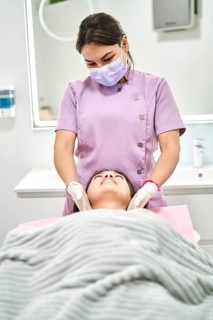 A highly skilled therapist provides a relaxing massage to a client at a beauty salon specializing