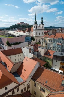 Urban scene with a mixture of traditional church towers and modern architecture, view of St