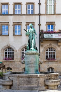 Dove girl on the Schlegelbrunnen fountain in front of the town hall, Döbeln, Saxony, Germany