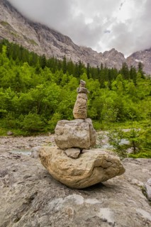 A stone mark at the Riss creek flowing through the Eng valley, Tyrol, Austria