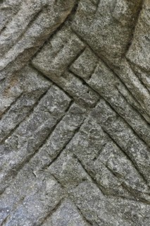 Grooves in the sandstone rock from carving millstones at the Hohllay cave in Berdorf, Little