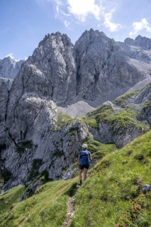 Hiker in the Wetterstein Mountains, Garmisch-Patenkirchen, Bavaria, Germany
