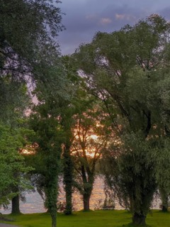 Sunset over Lake Chiemsee, view from the island of Frauenchiemsee, Bavaria, Germany