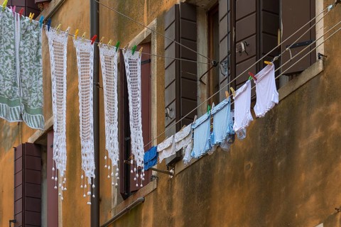 Laundry hung up for tourists in the Castello district, Venice, Veneto, Italy