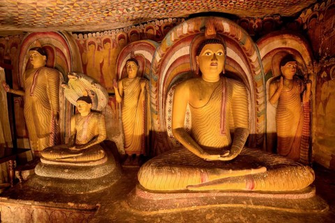 Buddha statues and murals in Dambulla Cave Temple, Dambulla, Sri Lanka