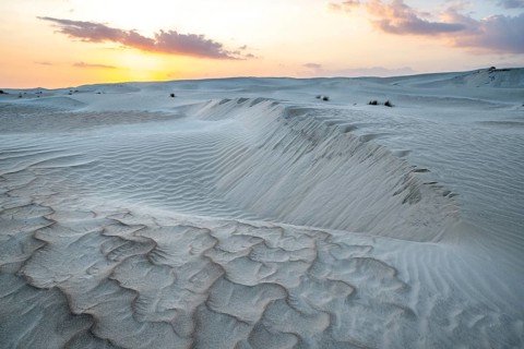 Sunset, white sand dunes in the Khaluf desert, Oman