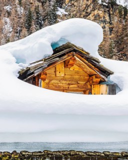 Snow-covered dormer window, mountain village of Zinal, Val d'Anniviers, Valais Alps, Canton Valais,