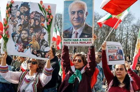 Demonstration by Iranians against the Iranian regime, with posters by Prince Reza Pahlavi, Berlin,