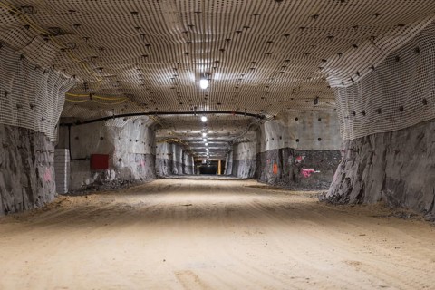 Exploitation hollow with the modern mesh on the ceiling in copper mine