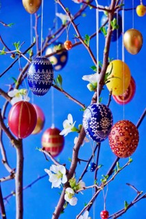 Easter, Easter bouquet with colorful Easter eggs, branches with flowers of an ornamental quince,