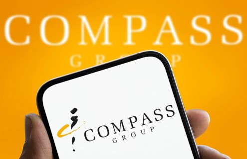 Compass Group logo is displayed on smartphone