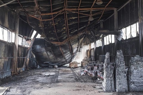 The ruins of a burned factory or warehouse in Lubin, Poland