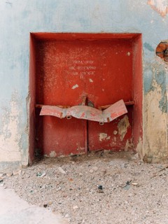 Niche for fire fighting equipment, abandoned Swift factory, The Swift refrigerator in Puerto San