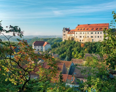 View of Wettin Castle and Town in the Lower Saale Valley nature park Park in morning light, Wettin,
