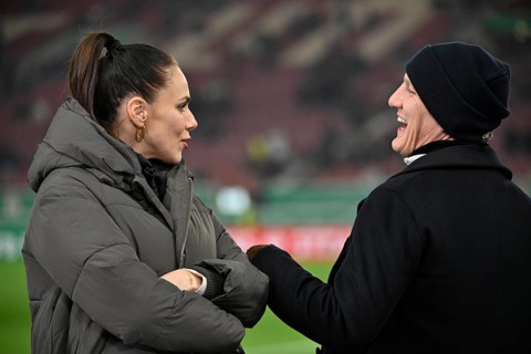 ARD TV pundit Bastian Schweinsteiger, cap, portrait in conversation with presenter Esther