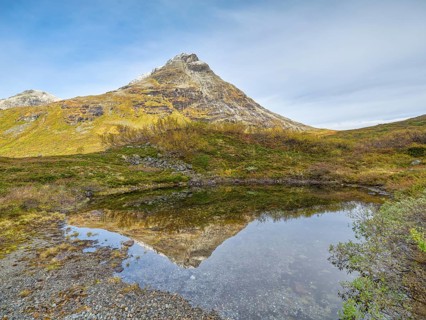 Lake in Valldalen valley with reflection, Reinheimen National Park, mountains, autumn, Møre og