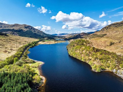 Mountains over Loch Iubhair from a drone, Crianlarich, Highlands, Scotland, United Kingdom