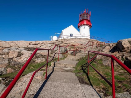 Lighthouse at Kap Lindesnes, the most souther lighthouse of Norway, located on rocky